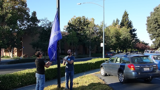 Lowering the flag